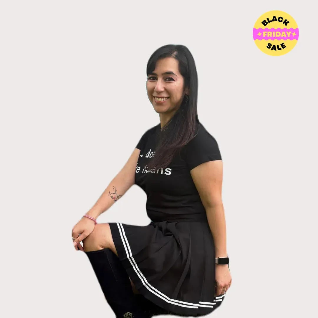 Black pleated skirt with white stripes