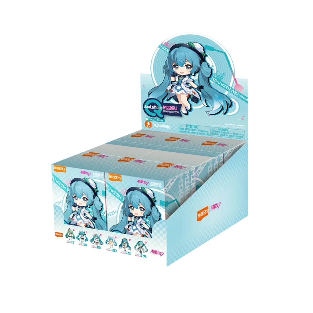 A retail display box filled with multiple mini blind packs, featuring Hatsune Miku character graphics on the packaging, set against a plain white background.