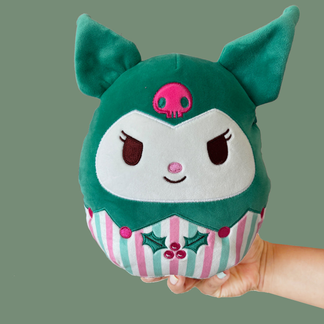 Sanrio characters Plush toy with green hood and striped body. Holiday plush