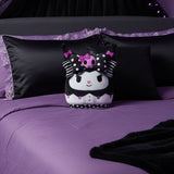 Decorative pillow with cartoon character on a purple bedspread