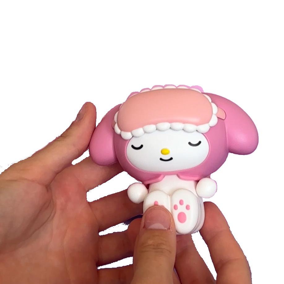 My Melody Pink and white cartoon character toy held in a hand against a white background