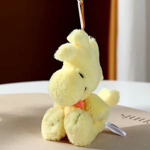 Yellow plush toy keychain of Woodstock from Snoopy
