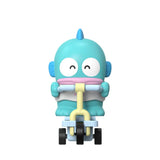 Hangyedon Toy figure of a character riding a tricycle on a white background