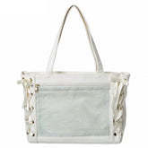 An off-white ita bag featuring a large front mesh pocket, dual shoulder straps, and decorative lace-up side details with silver-tone metal eyelets.