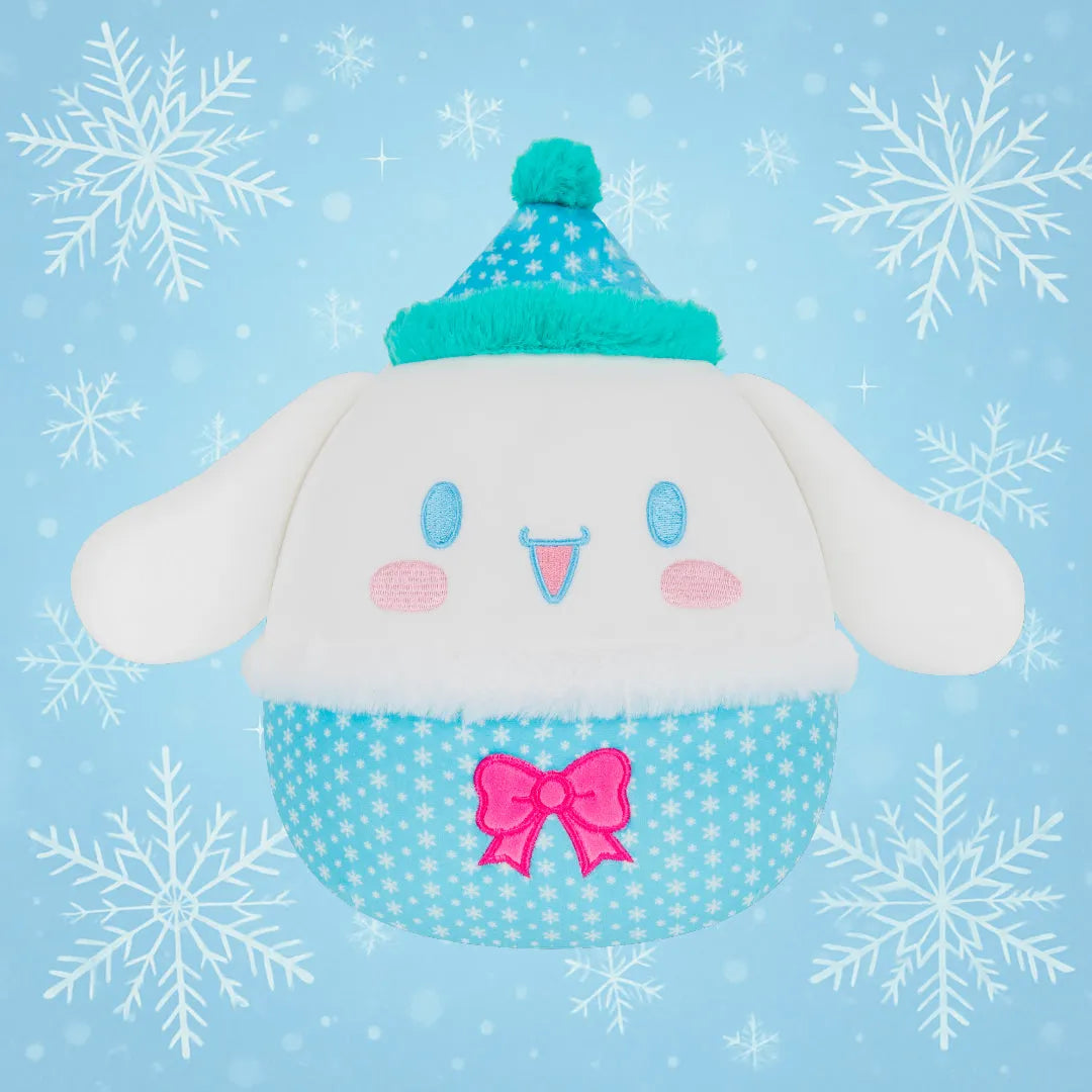 Plush toy with a blue hat and pink bow. Cinnamoroll Squishmallows