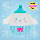Plush toy with a blue hat and pink bow. Cinnamoroll Squishmallows