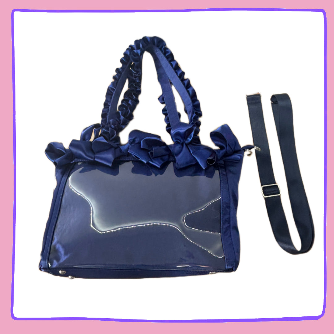 Navy Ruffle Ita Bag to display your pins!