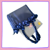 Navy Ruffle Ita Bag to display your pins!