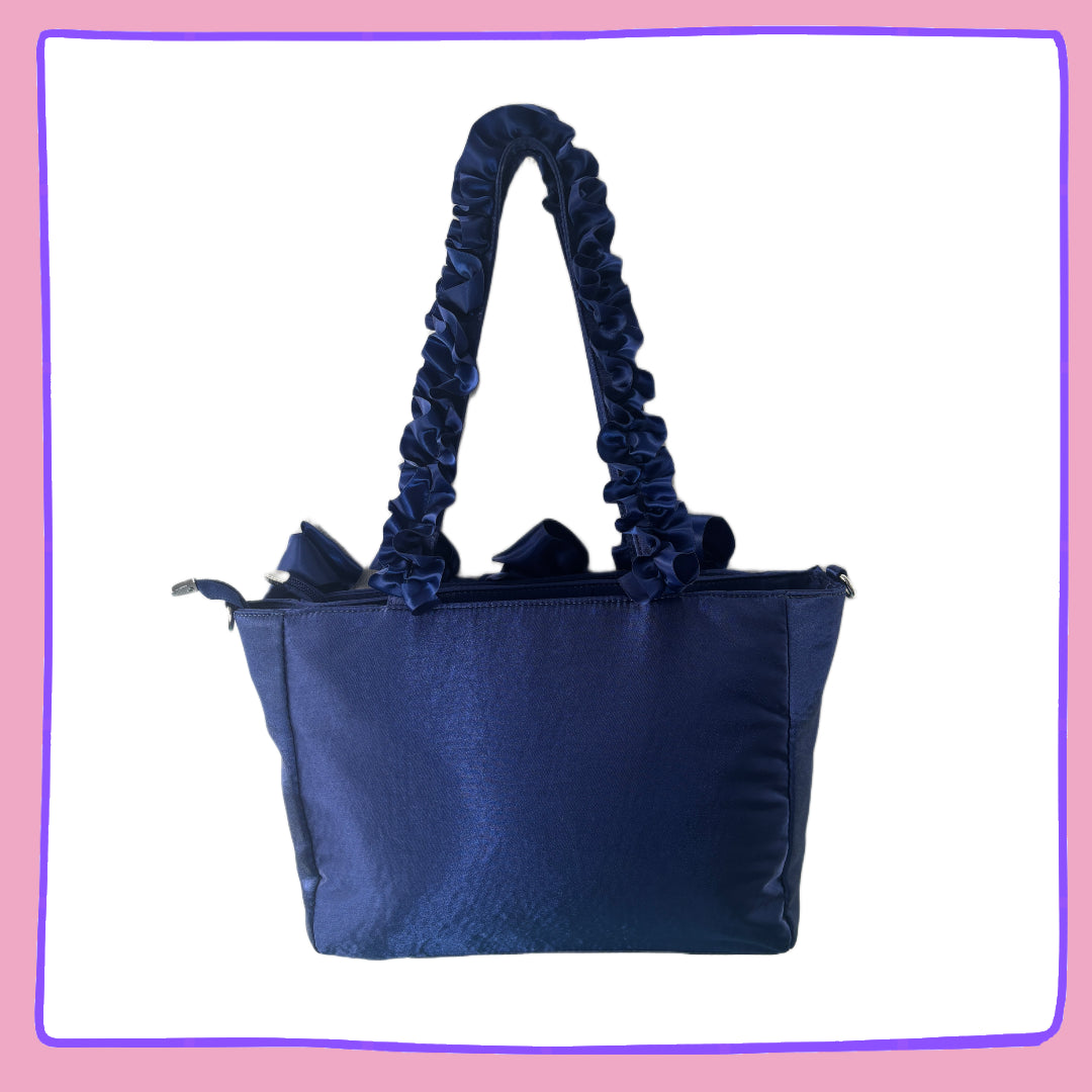 Navy Ruffle Ita Bag to display your pins!