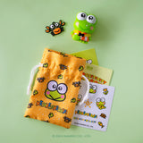 Orange drawstring bag with cartoon Keroppi frog from Sanrio