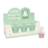 Display box of Miffy figurines with a single Miffy figurine in front