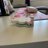 Miffy blind box phone holder flat on a desk