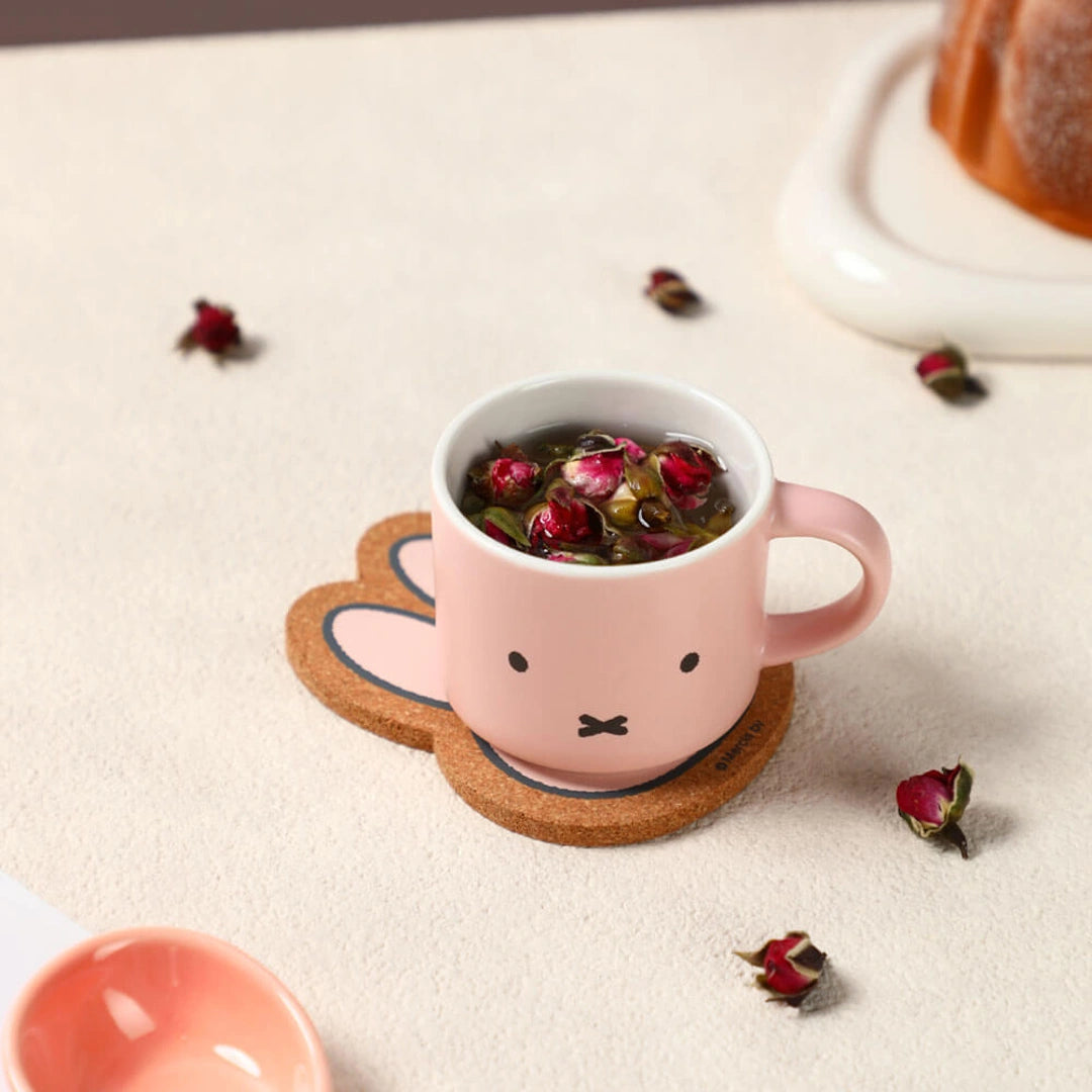 Pink mug with a Miffy Bunny face design