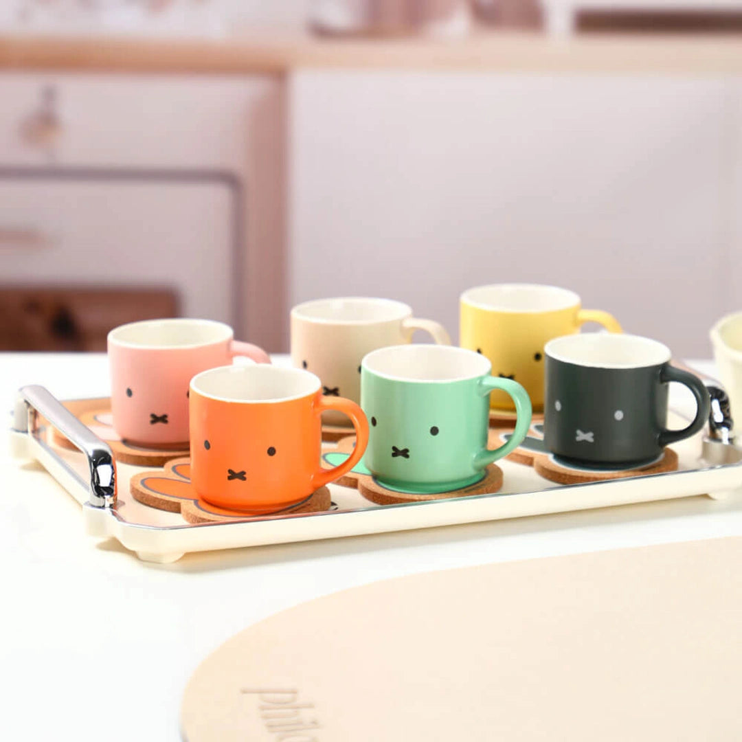 Set of colorful mugs with Miffy Bunny face design