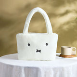 Miffy White plush bag with face design on a table