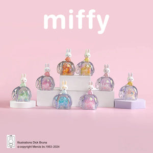Collection of miffy-themed figurines on a pink background with 'miffy' branding.