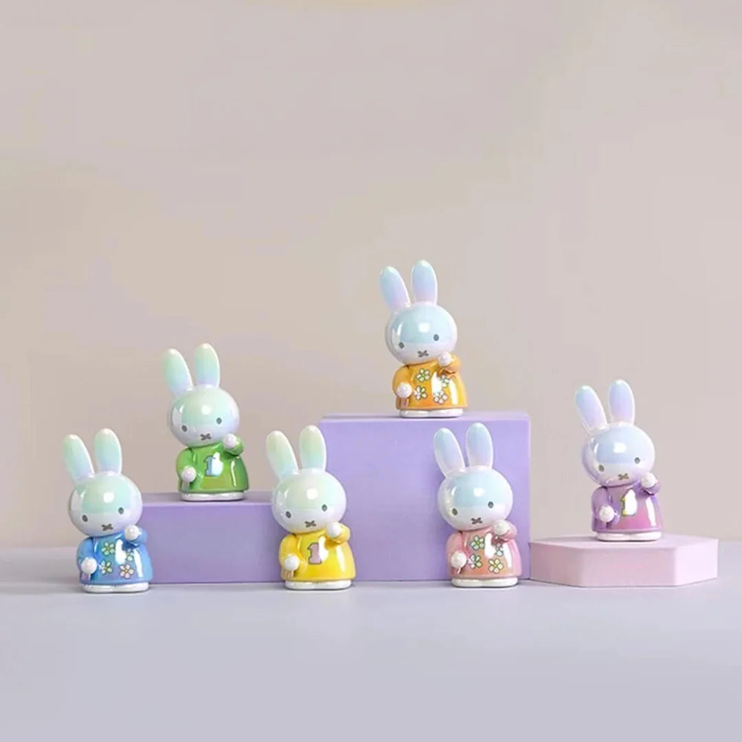 Set of small rabbit figurines on colorful stands, part of Miffy blind box series