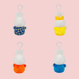 Back view of four Miffy plush keyrings showing outfits and clips