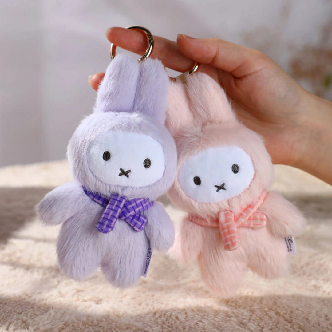 Two plush keychains, one purple and one pink. Miffy surprise boxes. Dispatch from Brisbane