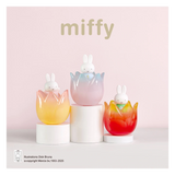 Three colorful rabbit-shaped pots with 'miffy' branding on a light pink background.