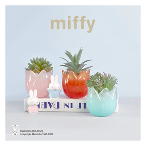 Decorative set with colorful planters and small miffy figurines on a light blue background.