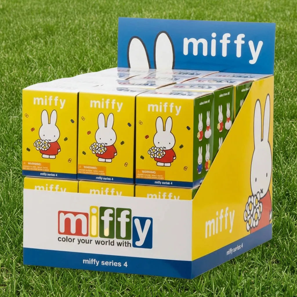 Display box of Miffy toys with colorful packaging and character illustrations.