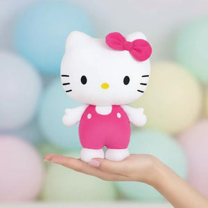 Hello Kitty Plush toy with a pink bow and ink costume. Official Sanrio merchandise