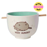 Front view of Pusheen Very Hungry noodle bowl with turquoise interior and chopstick holder – kawaii ramen bowl