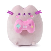 Plush toy resembling a cat with a pink game controller on a white background
