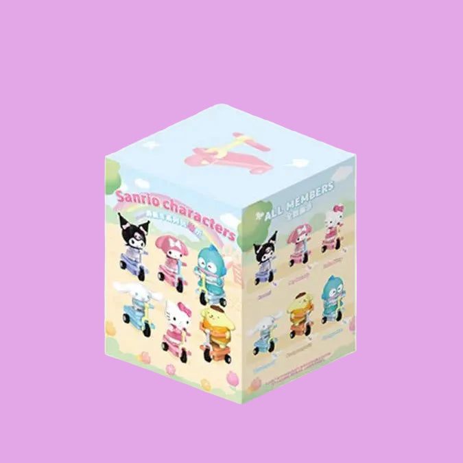 Box of Sanrio character figurines on a white background