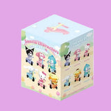 Box of Sanrio character figurines on a white background