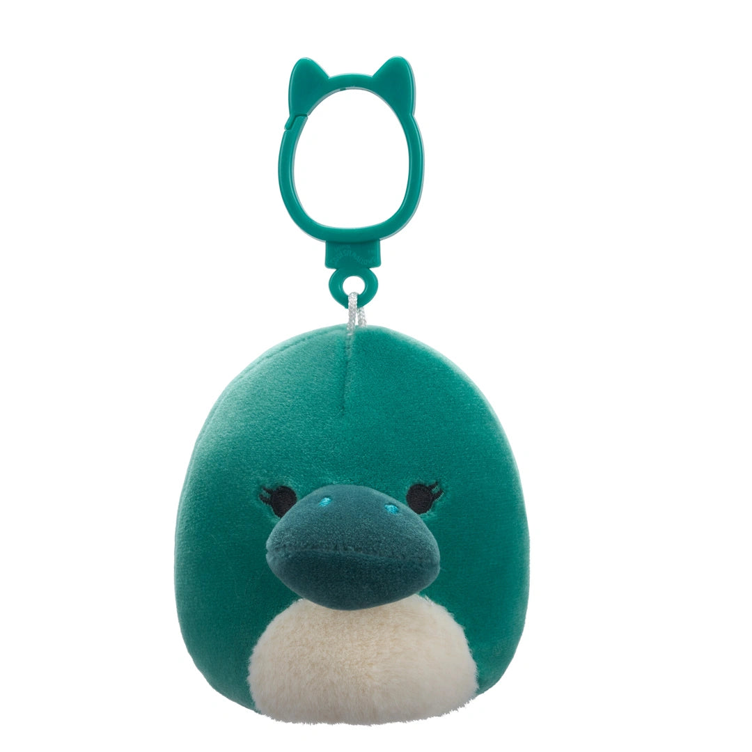 Teal plush keychain with a face on a white background