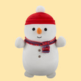 Plush snowman toy with a red hat and scarf