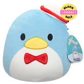 Plush toy penguin with a red bow tie and hat on a white background
