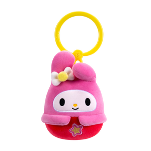 Plush toy with a pink hood and yellow bow on a white background
