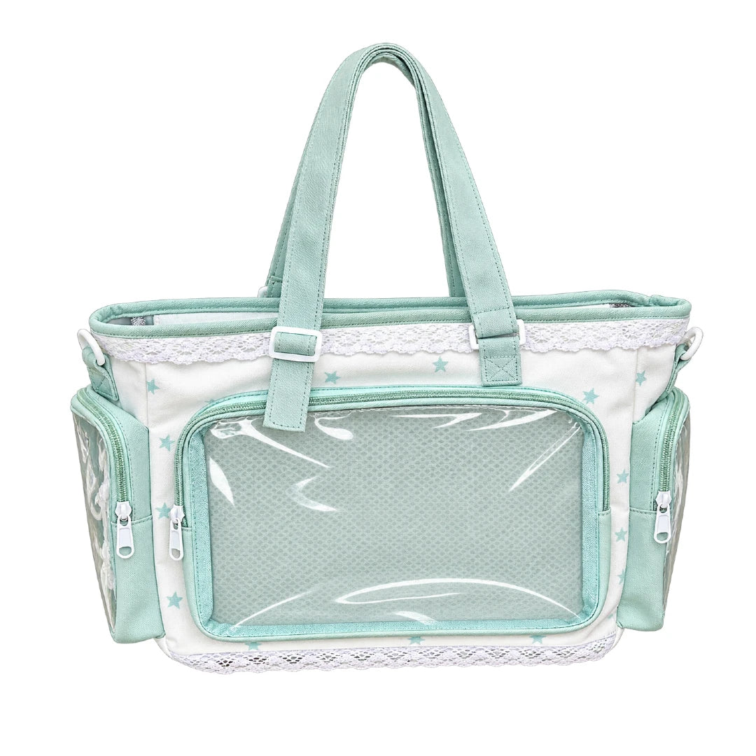 Green and white shoulder bag with clear front and side windows to display plushies, keychains and trinkets in a white background