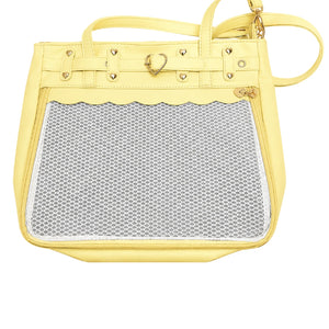 A light yellow faux-leather ita handbag with a large scalloped mesh window on the front, gold-tone hardware, and a top handle, shown against a plain white background.