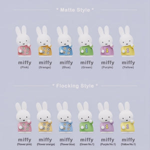 Set of miffy figurines in various colors and styles on a light purple background.