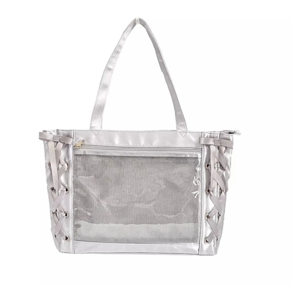 Ita silver handbag with silver straps and clear window on a white background
