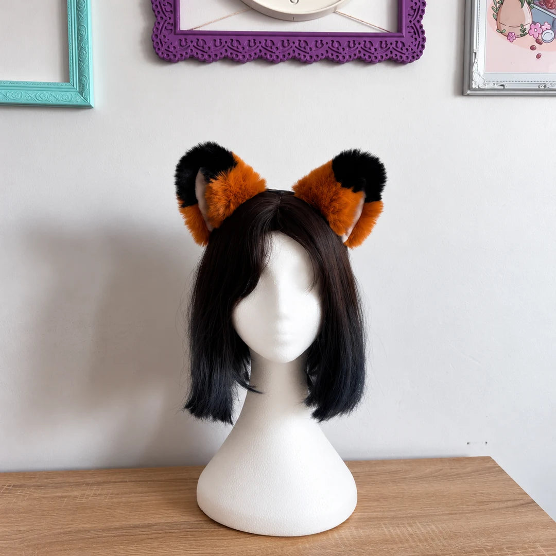 head mannequin wearing cat ears with black tips