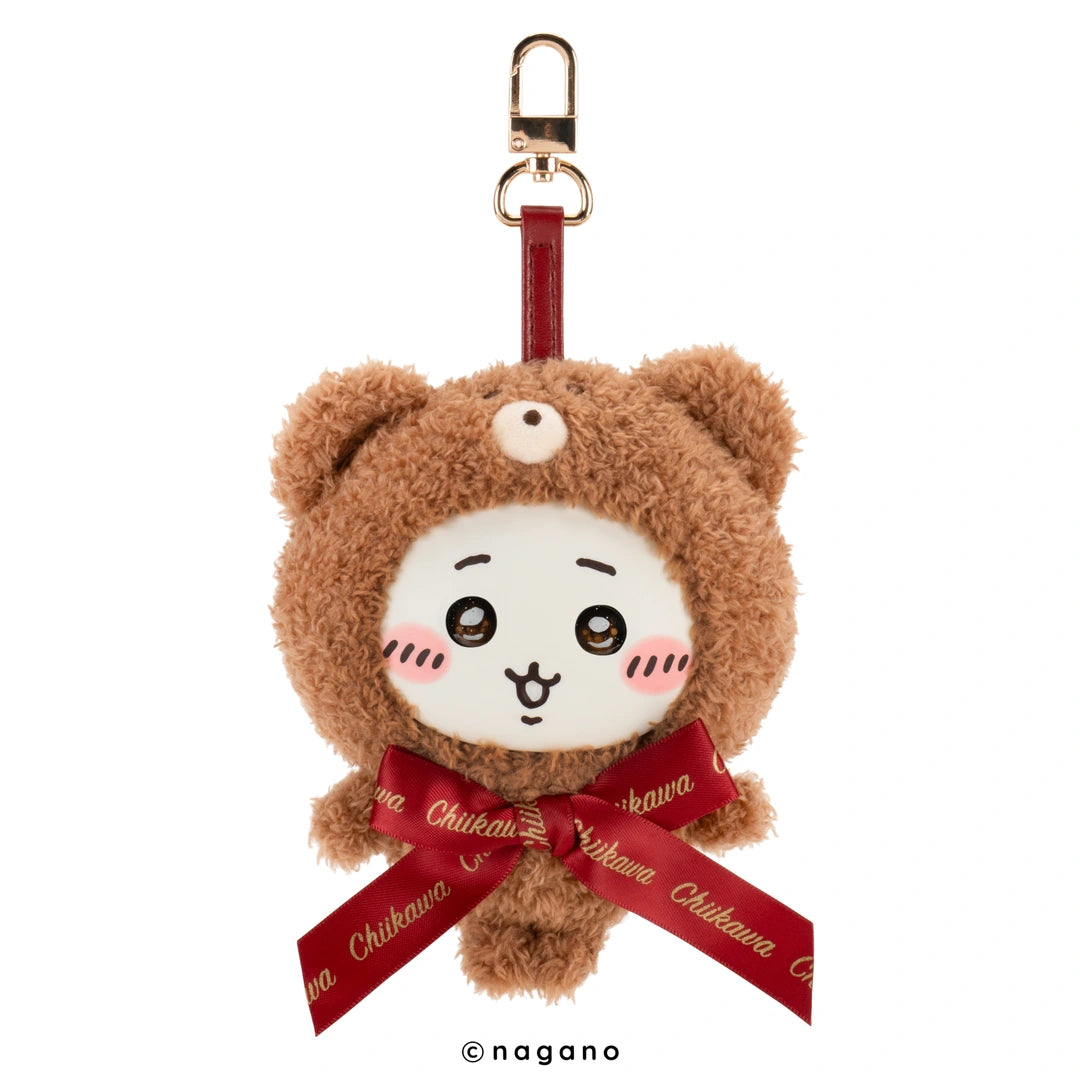 Plush bear keychain with a red ribbon and 'Nagano' branding on a white backgrounds