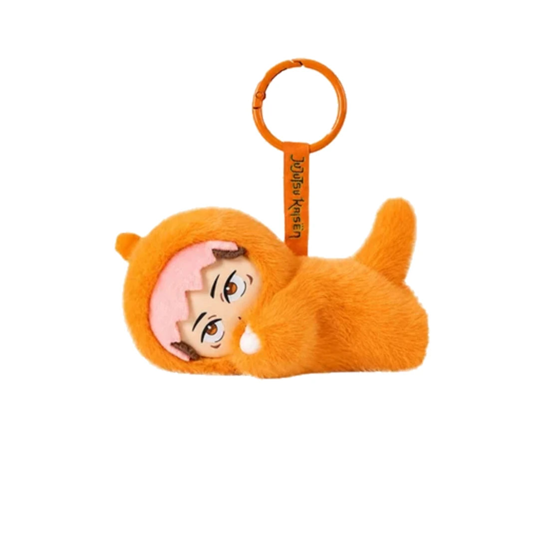 An orange plush JJK character keychain shaped like a curled-up figure with a pink face and printed eyes, attached to an orange key ring with a vertical tag reading 'Jujutsu Kaisen'.