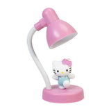 Pink desk lamp with a Hello Kitty figure on a white background