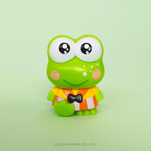 Cartoon frog Keroppi character with a colorful outfit on a light green background