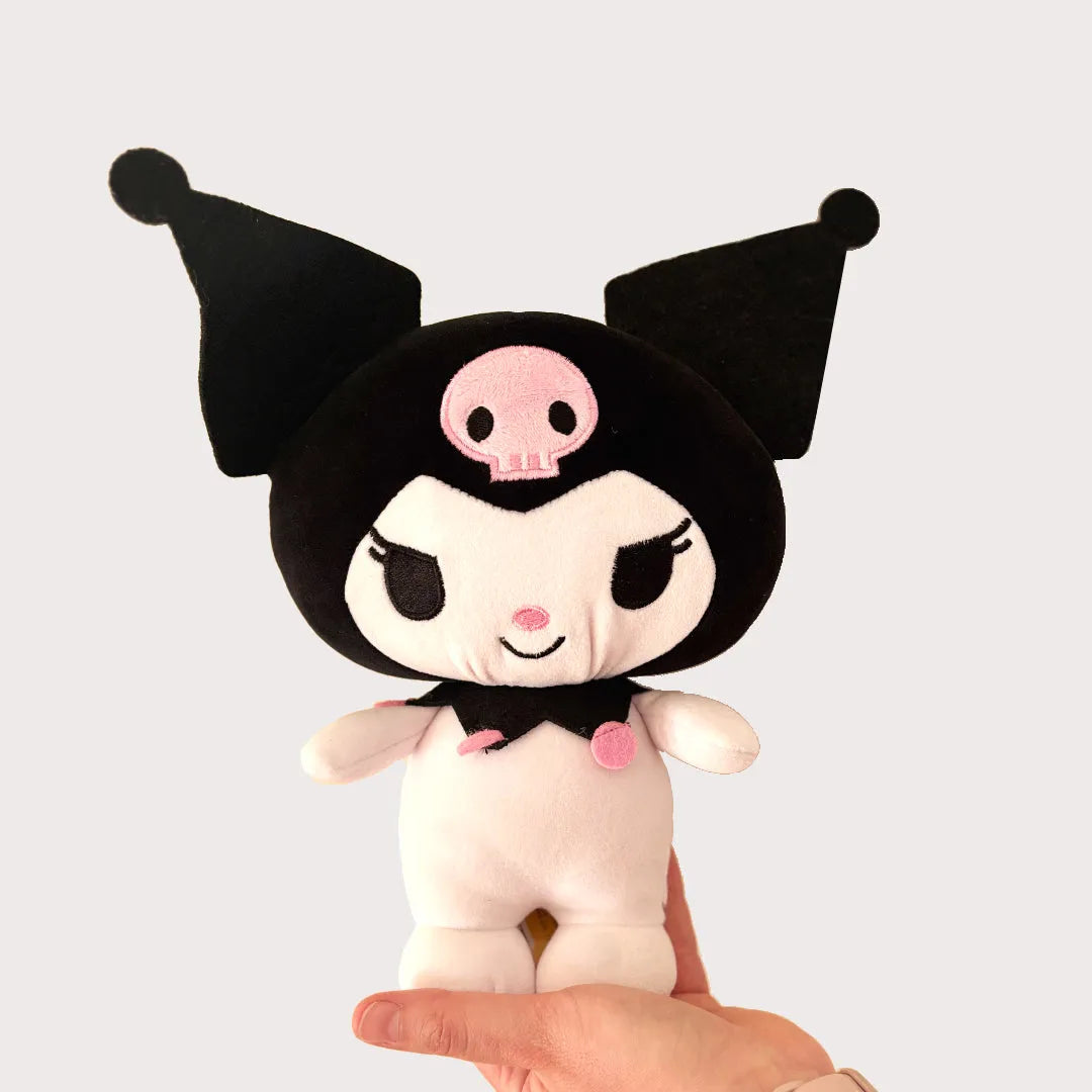 Kutomi from Hello Kitty plush toy held in hand 