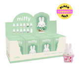 Display box of Miffy figurines with a single Miffy figurine in front