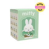 Miffy toy packaging with a green background and Miffy character on it.