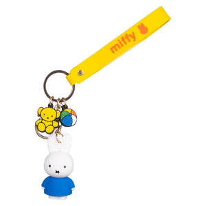Keychain with a white Miffy and colorful bear, and rainbow beach ball charm on a yellow strap with 'miffy' branding.