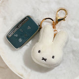 Miffy face plush keychain attached to car keys for size reference