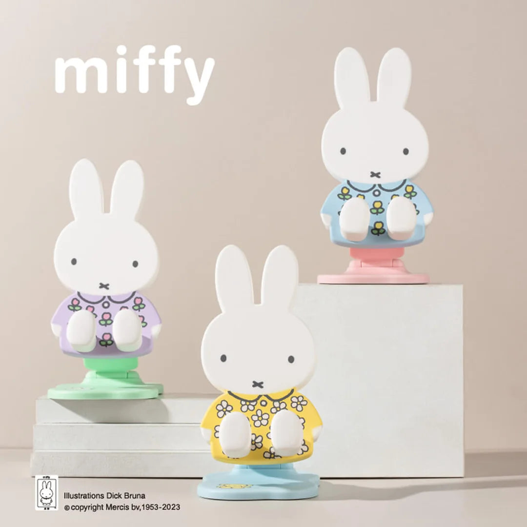 Three Miffy phone stands in different outfits, all part of Miffy blind box collection 